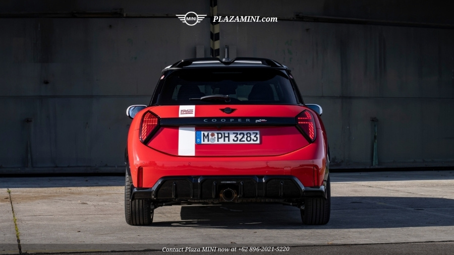 Rear view red MINI 3 Door John Cooper Works Victory Edition showing sporty diffuser and dual exhaust.